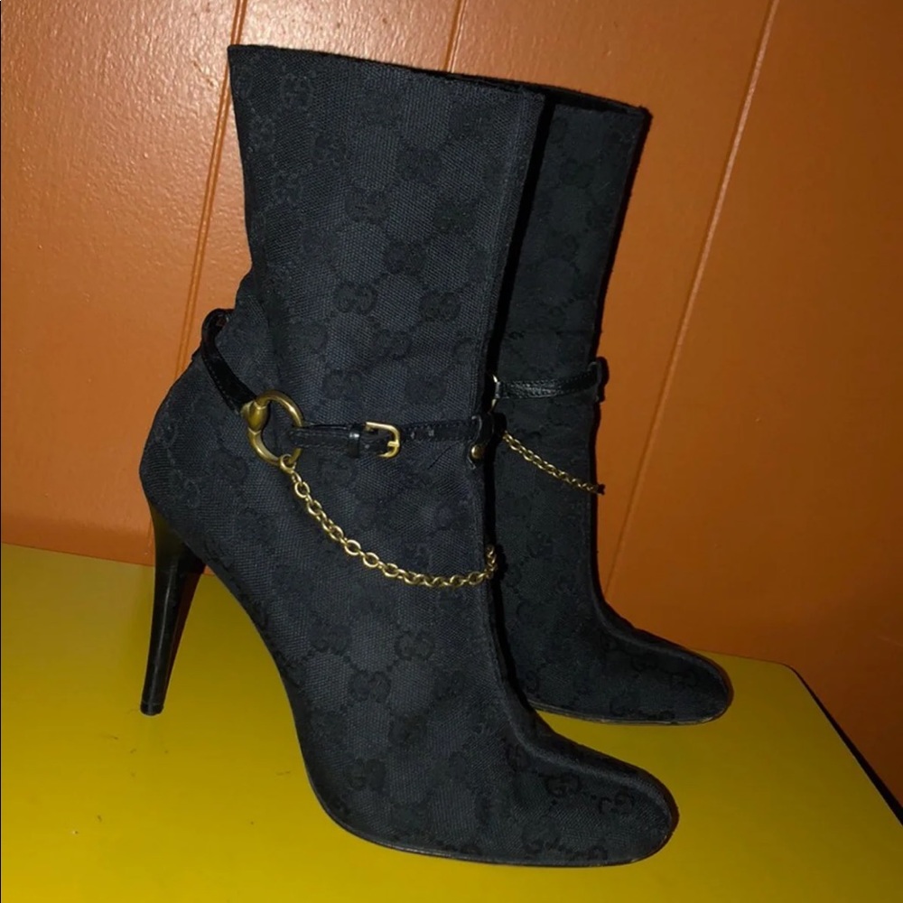 Gucci Monogram boots.